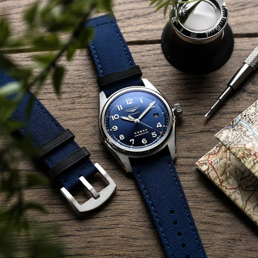 22mm blue canvas quick-release watch strap on Longines Spirit watch, durable premium watch band with textured fabric finish and versatile everyday style.