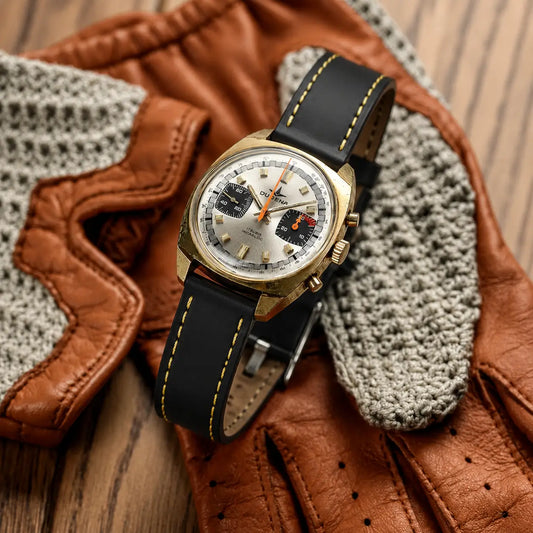 20mm Black Italian leather watch strap fitted on vintage Dugena chronograph watch, premium handcrafted watch band with contrast stitching and classic racing style.