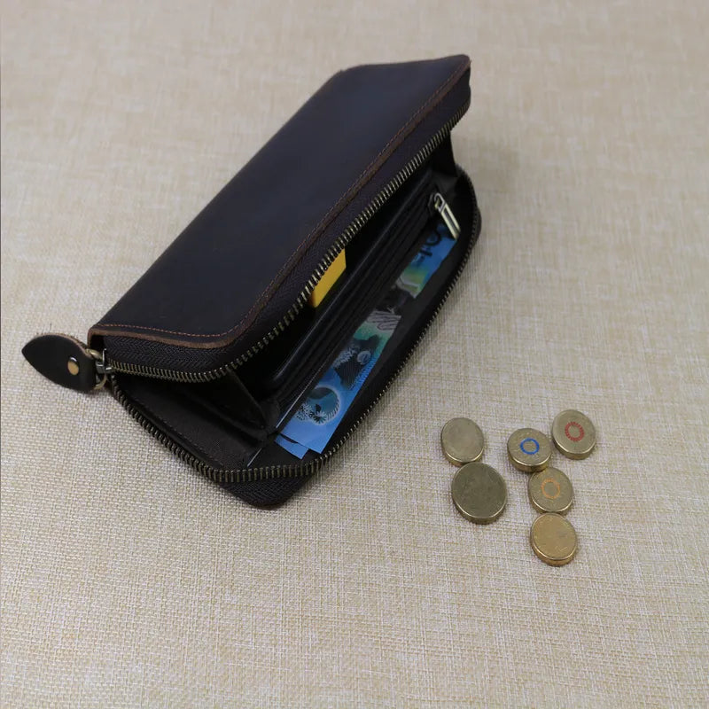 Dark Brown ladies wallet displaying the adjstment of curruncy notes , coins,cards,receipts.