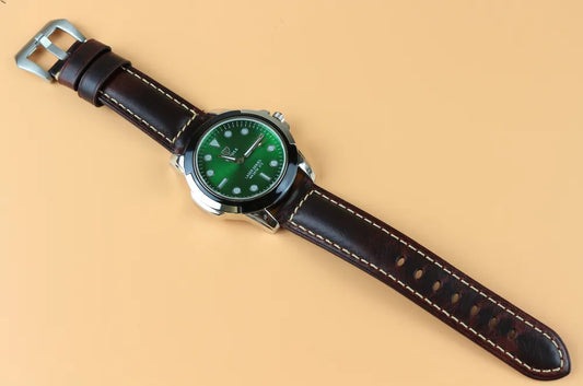 Dark Brown Waxed Leather Watch Strap with watch in a display