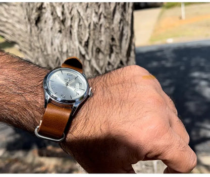 a person wearing a nato watch band