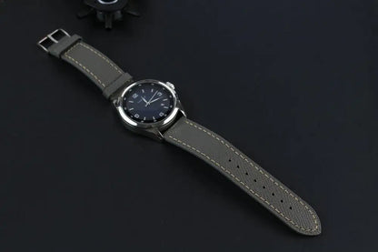 Grey Epsom Leather Watch Strap in a display with a watch