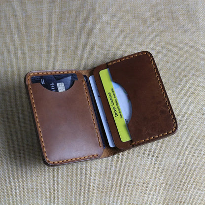 Cardholder with cash pocket