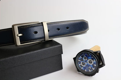 a watch next to a box