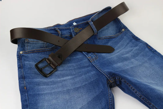 a pair of blue jeans with a black belt