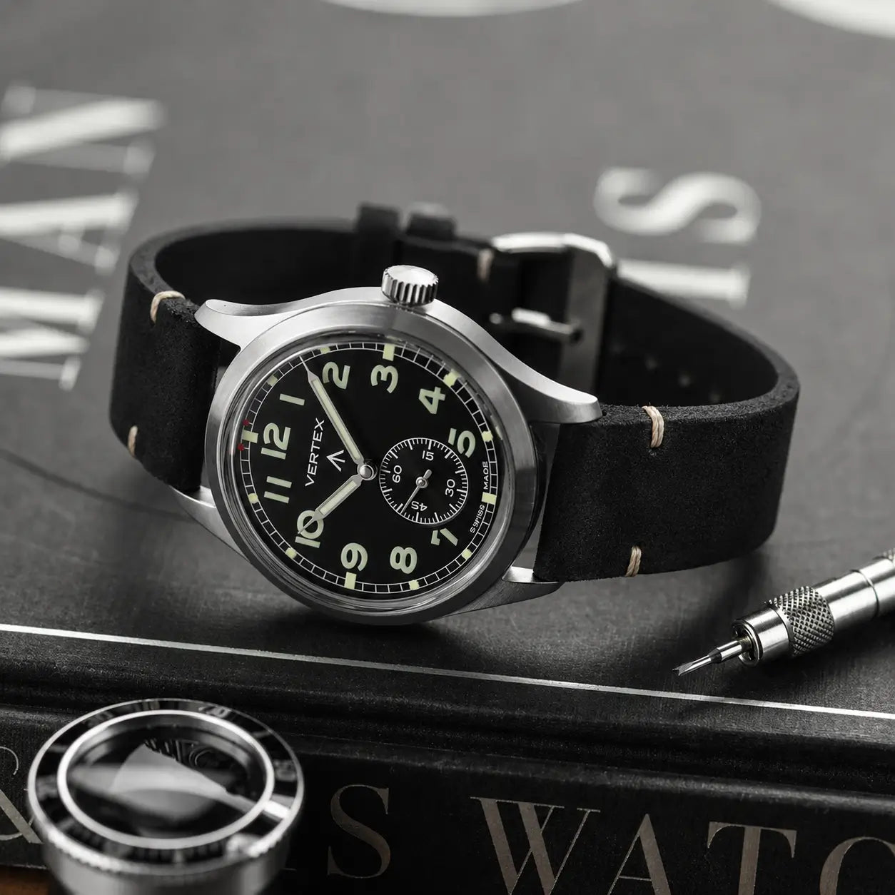 20mm black suede leather watch strap paired with Vertex military watch, handcrafted vintage watch band with rugged heritage styling.