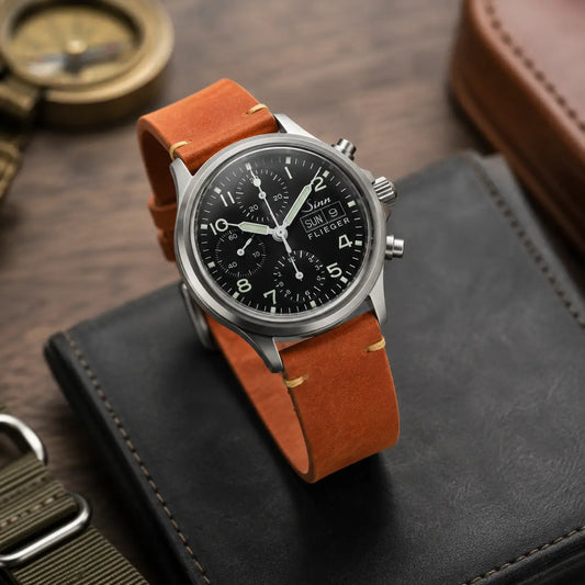 20mm tan brown Italian leather watch strap paired with Sinn Flieger chronograph watch, handcrafted vintage-style leather watch band with saddle stitching.