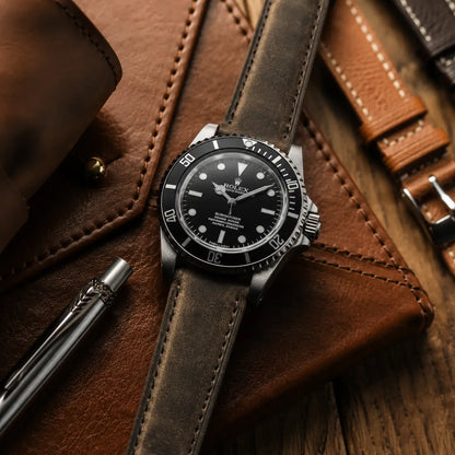 20mm dark grey vintage leather watch strap on Rolex Submariner, handcrafted distressed leather watch band with rugged classic styling.