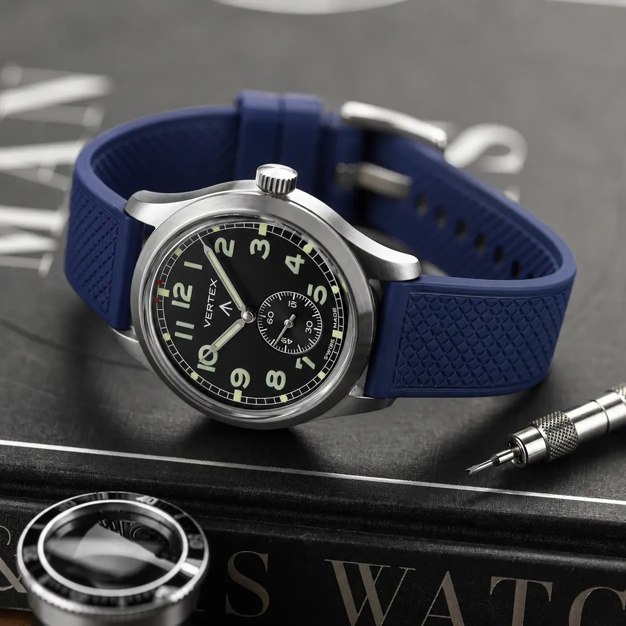 20mm blue FKM quick-release rubber watch strap on Vertex field watch, premium textured waterproof watch band with durable sport styling and everyday comfort.