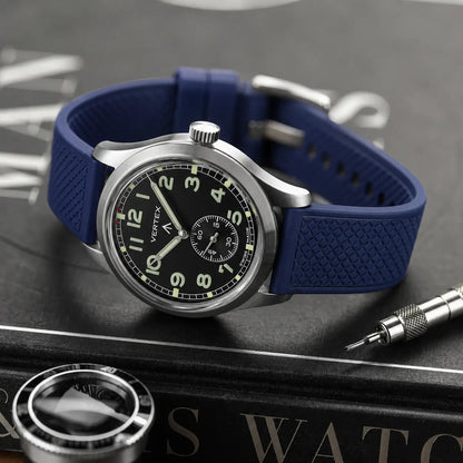 20mm blue FKM quick-release rubber watch strap on Vertex field watch, premium textured waterproof watch band with durable sport styling and everyday comfort.