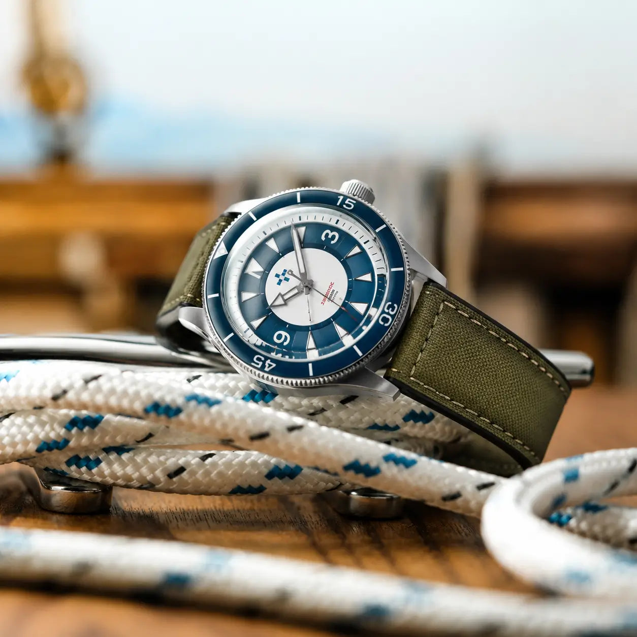 22mm olive green canvas watch strap on Aquastar dive watch display, premium textured watch band with nautical-inspired styling and everyday comfort.