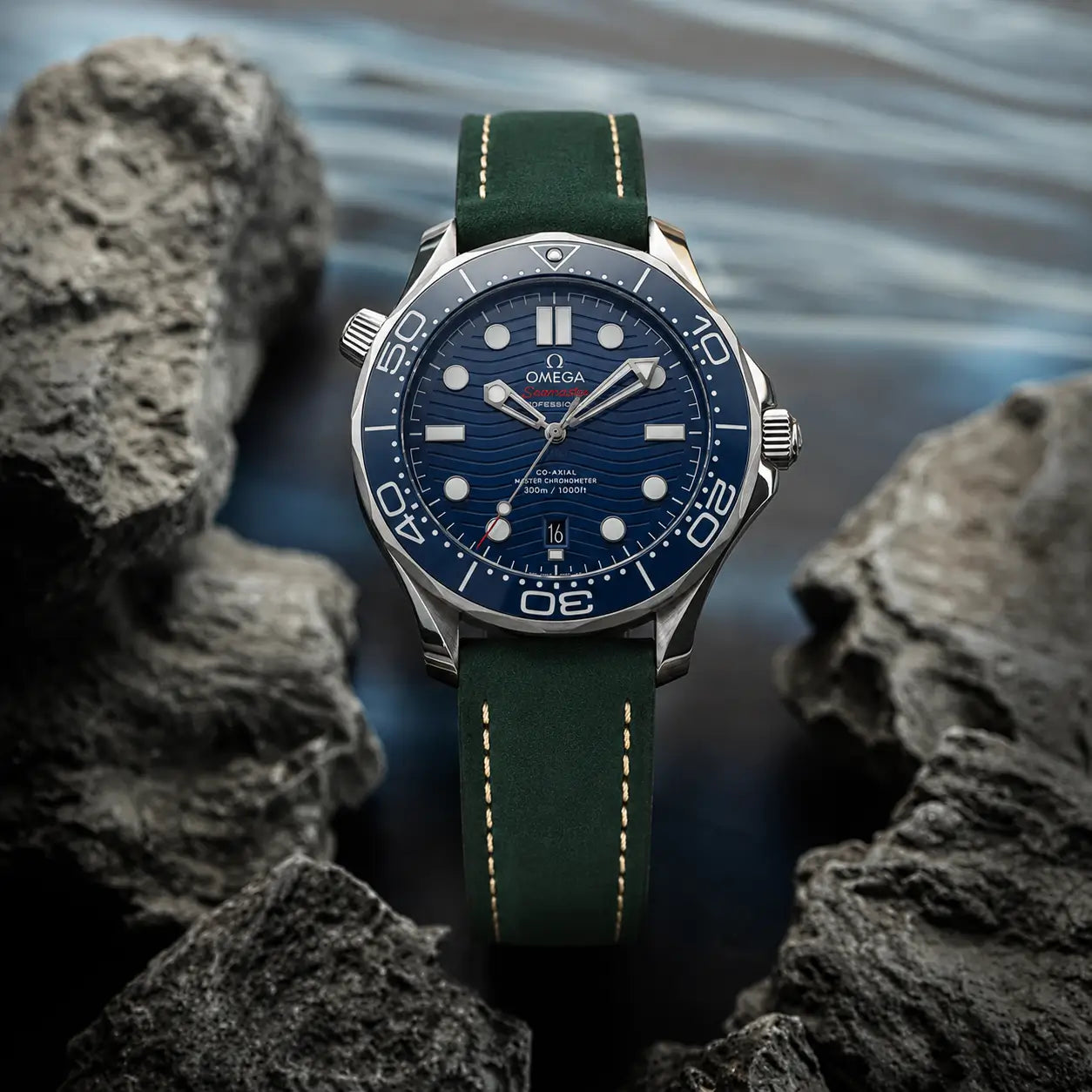 20mm green Italian leather watch strap fitted on Omega Seamaster Diver 300M watch, premium handcrafted leather watch band with classic contrast stitching.