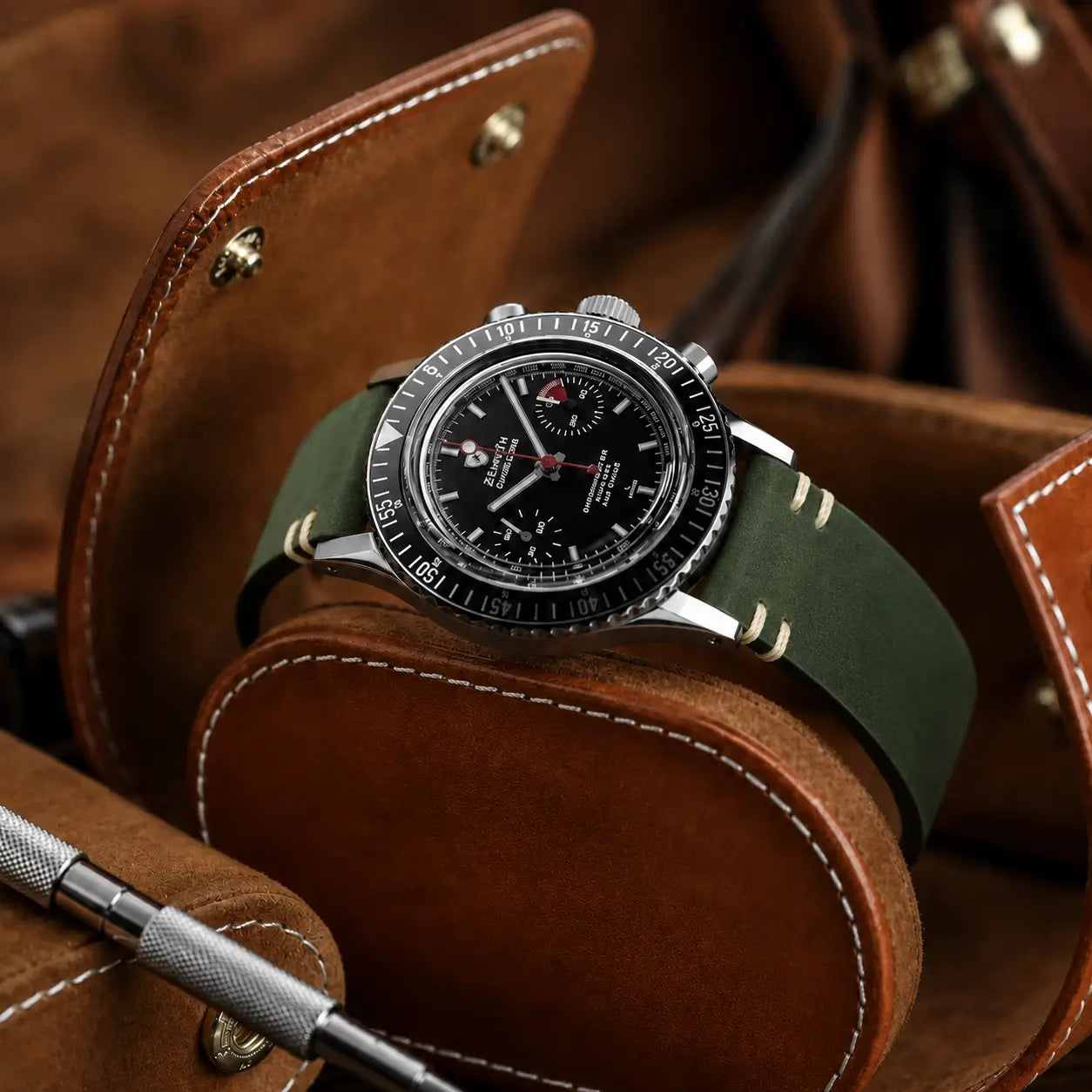 22mm olive green leather watch strap paired with Zenith Chronomaster Revival watch, handcrafted vintage-style watch band with contrast stitching and premium finish.