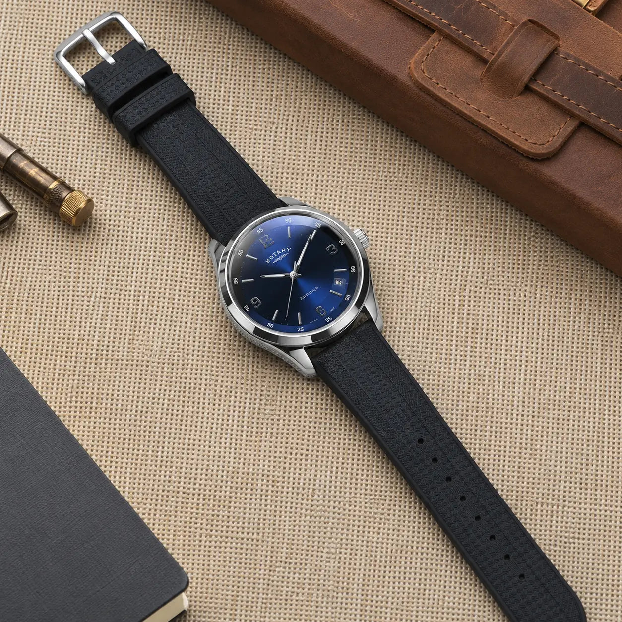 20mm black rubber watch strap on Rotary dress watch, premium textured sport watch band with flexible waterproof construction and versatile everyday style.