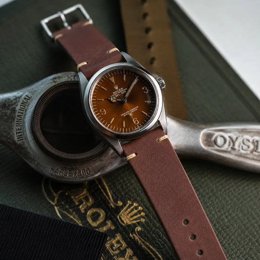 20mm Vintage brown Italian vegetable tanned leather watch strap paired with Rolex Oyster Perpetual, handcrafted premium watch band with classic vintage styling.