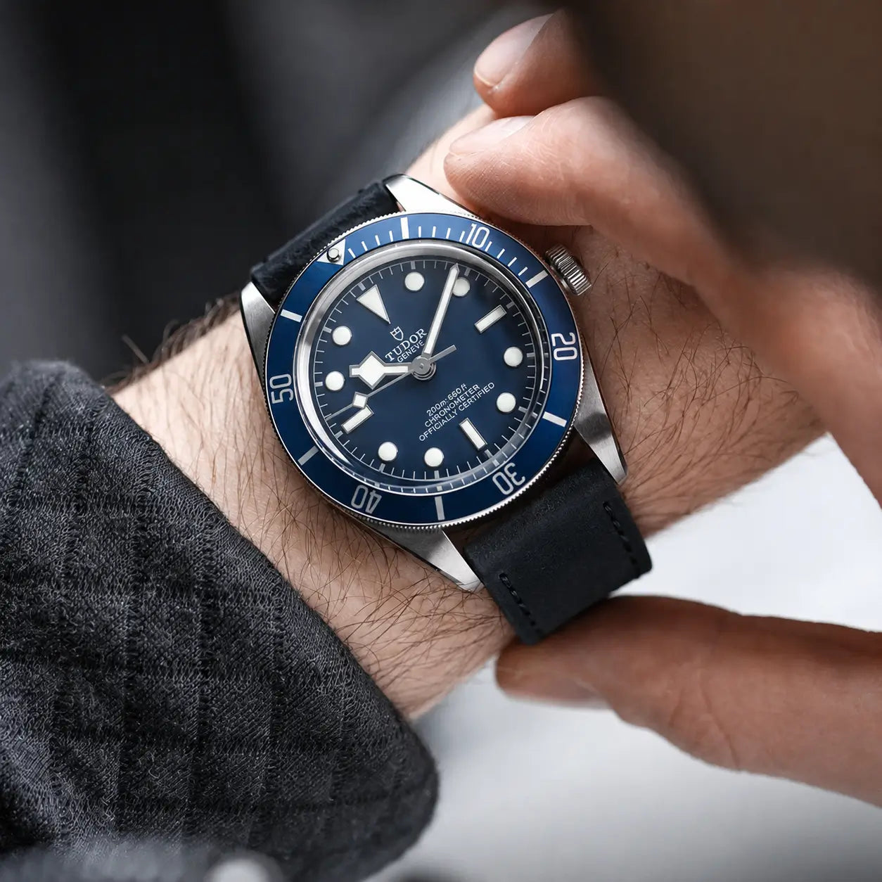 20mm black leather strap on Tudor Black Bay Blue dive watch wrist shot, handcrafted premium watch band with modern sport and casual styling.