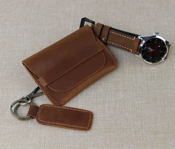 Display of Card Case With Flap with matching keychain and watch strap