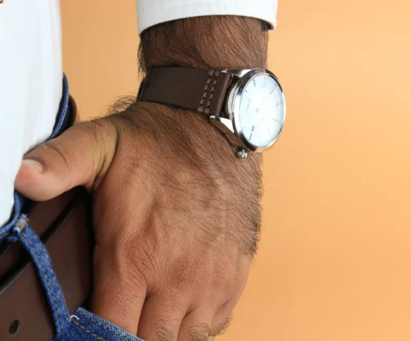 A man wearing Dark brown vegetable tanned Leather watch strap