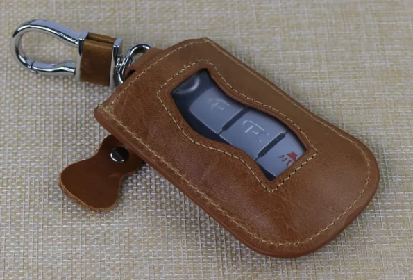 car key ring in brown colour
