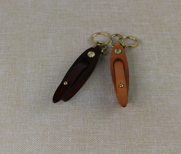Display ofCute Key chain for Women in brow and dark brown colour