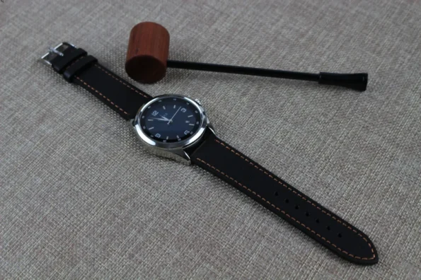 Black Pebble Leather Watch Band with watch in a display