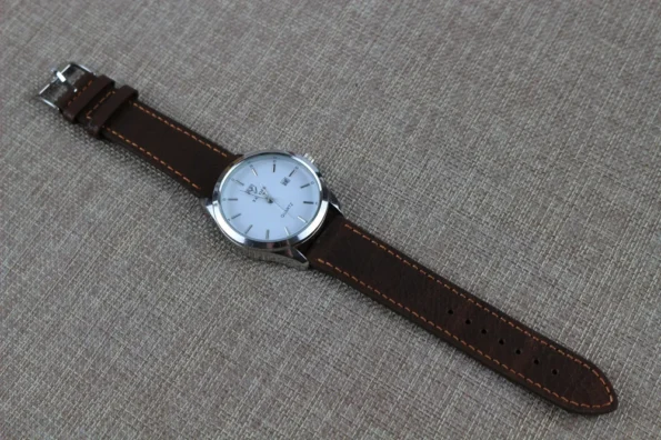 Display of Pebbled Brown Leather Watch Strap